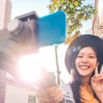 woman making video blog with smartphone